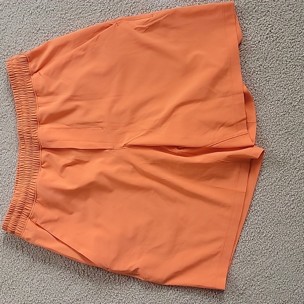 Lululemon Pace Breaker Linerless Short  7" Rush Orange